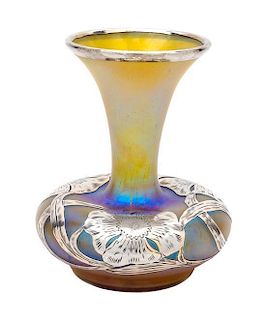 * A Silver Overlay Iridescent Glass Vase Height 6 1/4 inches.