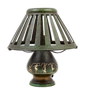 An Art Deco Patinated Bronze Lamp Height 12 1/2 x diameter 11 1/4 inches.