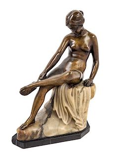 An Art Nouveau Bronze and Onyx Figure Height 12 3/4 inches.