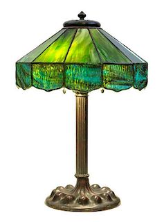An American Leaded Slag Glass Lamp Height 19 1/2 x diameter of shade 13 1/4 inches.