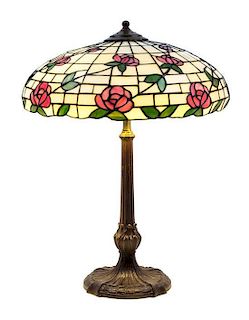 An American Leaded Glass Table Lamp Height 25 x shade diameter 18 inches.