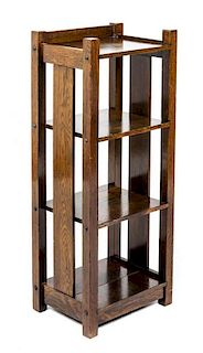 An Arts and Crafts Oak Four-Tier Book Shelf Height 40 inches.