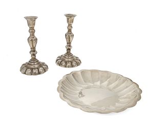 A pair of sterling silver candlesticks and serving bowl