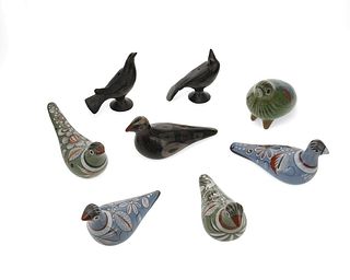 A group of pottery bird figures