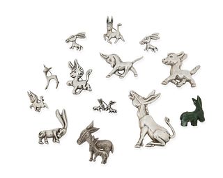 A group of Mexican donkey brooches