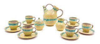 * A Stoneware Tea Service, Guido Gambone Height of teapot 9 1/4 inches.