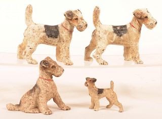 4 Hubley Wire Haired Fox Terrier Dog Figures.