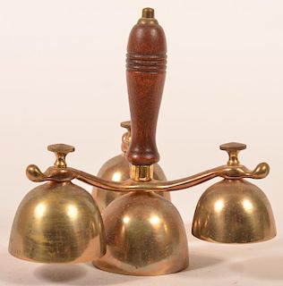 Brass Coachman Bell with turn wood handle.