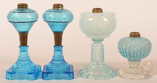 Four Various Glass Fluid Lamps.