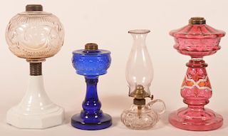Four Various Glass Fluid Lamps. T