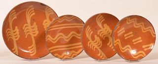 4 Greg Shooner Redware Slip Decorated Plates.