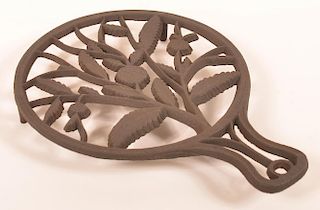Cast Iron Floral and Foliate Pattern Trivet.