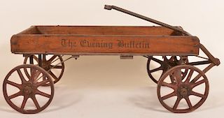 Wooden pull wagon "The Evening Bulketin"