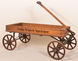 Wooden pull wagon stenciled "Auto Wheel Speeder"