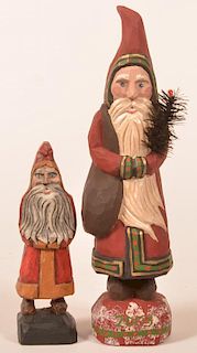 2 Folk Art Santa carving by Johnathon Bastian.