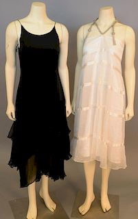 Group of fourteen womens dresses to include Ondademar, BCBG Maxazria, Milly, Launury with new tag (retail $195.), etc.