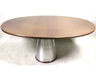 CONTEMPORARY OVAL TABLE ON STAINLESS BASE