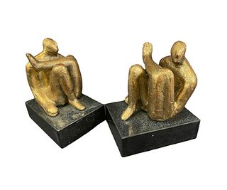 PAIR OF AMADEO SITTING STATUES