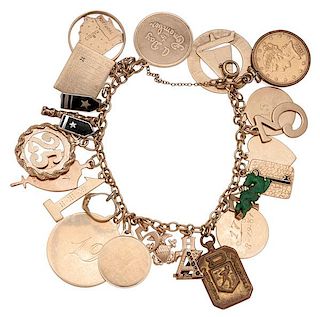 Charm Bracelet in 14 Karat Yellow Gold with Vintage Charms 