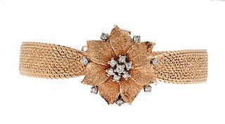 Eloga Bracelet Watch in 14 Karat Yellow Gold with Diamonds 