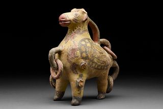 CENTRAL ASIA POTTERY COW WITH SUSPENSION LOOPS