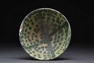 ABBASID DOTTED SPLASHWARE BOWL POSSIBLY INFLUENCED BY CHINEESE TANGWARE