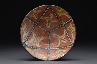 ISLAMIC TERRACOTTA DECORATED BOWL WITH PEARL AND LEAF MOTIFS