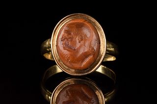 RARE ROMAN CARNELIAN INTAGLIO WITH A FLAVIAN PORTRAIT IN GOLD RING