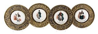 (DICKENS, CHARLES) Four Gilt Metal Mounted Wheeling Porcelain Plaques depicting Dickensian characters