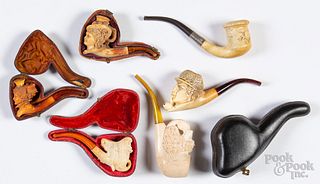 Six carved Meerschaum pipes.
