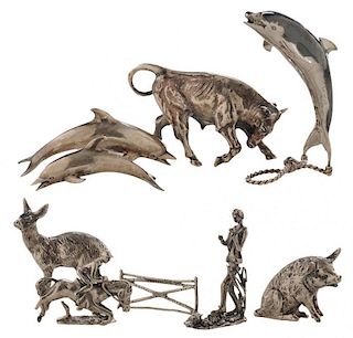 Eight Miniature Silver Figures