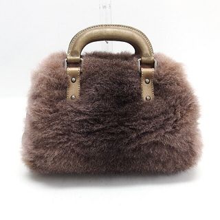 Chanel fur handbag x gold