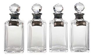Four Venetian Style Crystal Decanters