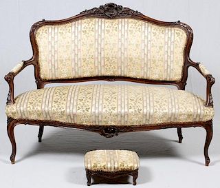 FRENCH CARVED WALNUT SETTEE AND FOOTSTOOL