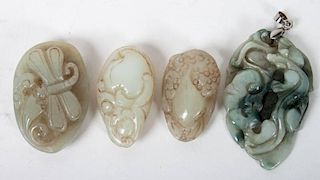 Four Chinese carved pendants