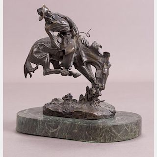 After Frederic Remington (1861-1909) Outlaw, Bronze,