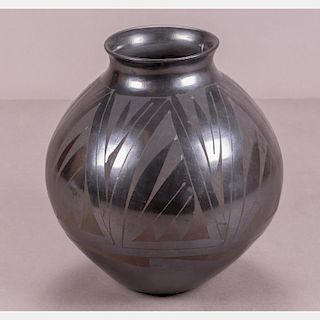 A Santa Clara Pottery Vase by Amalia Mora, 20th Century.
