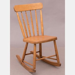 An American Pine Rocking Chair, 19th Century.
