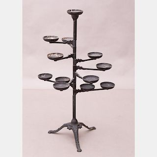 A Victorian Wrought and Painted Metal Plant Stand, 20th Century.
