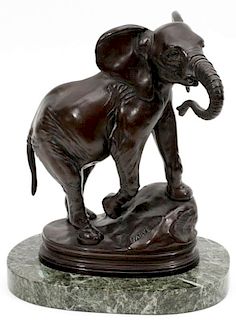 AFTER BARYE PATINATED BRONZE OF AN ELEPHANT