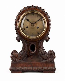 Victorian carved oak mantel clock