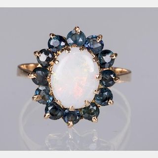 A 14kt. Yellow Gold, Opal and Sapphire Ring,