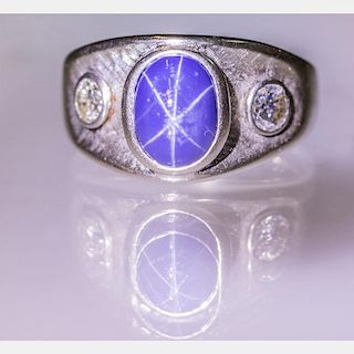 A 10kt. White Gold, Cabochon Cut Linde Star Sapphire and Diamond Ring,