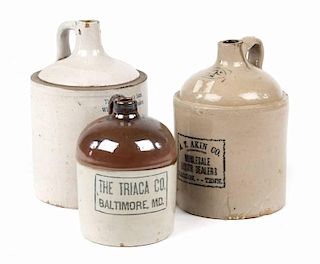 Three American stoneware advertising jugs