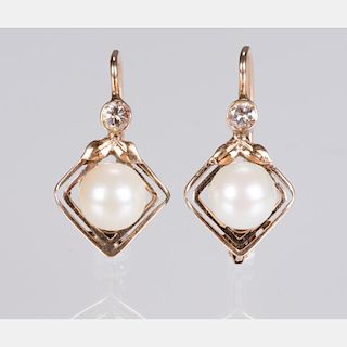 A Pair of 14kt. Yellow Gold, Diamond and Pearl Earrings.