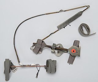 Kepplinger Holdout Device. American, ca. 1910. A knee spread device that straps to the knees and arm and when the knees are spread apart delivers a ca