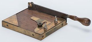 Card Trimmer and Card Marking Device. Maker unknown, American, ca. 1890. Wood with brass fittings. The triangular brass corner piece with holes found 