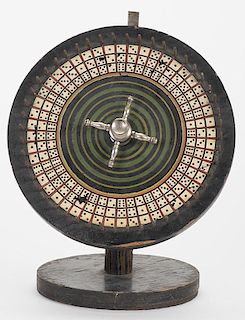 Dice Gambling Wheel on Stand. American, ca. 1900. With slight damage on the wheelÍs rim, clacker missing, otherwise very good. 9 _ x 12î.