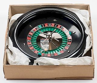 Jeu de Roulette. France, 1987. Black Bakelite wheel (17î diam.) with ball and instruction sheet. Mint in the original box and tissue.