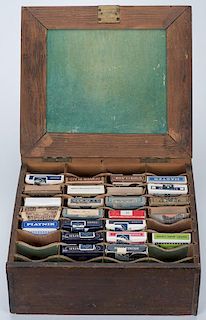 Wooden Playing Card Box. Maker and date unknown. Nicely dovetailed box with 34 compartments to hold decks of playing cards. Includes 24 decks of cards